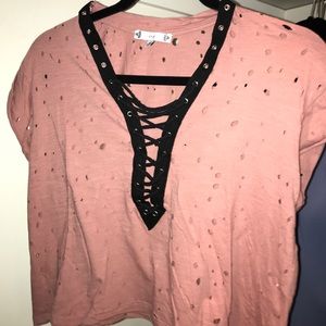 dark pink/purple cut out shirt with laced front.